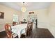Dining room with seating for eight and hardwood floors at 946 Cornwall Sw Ct, Marietta, GA 30064