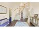 Inviting foyer with hardwood floors, staircase, and decor at 946 Cornwall Sw Ct, Marietta, GA 30064