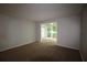 Neutral living room with a view of the deck at 1105 Natchez Trce, Atlanta, GA 30350