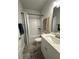 Bathroom featuring a shower-tub combo with a decorative curtain at 3006 Fairway Dr, Villa Rica, GA 30180