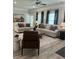 Living room with two couches, coffee table, decorative pillows and lots of natural light at 3006 Fairway Dr, Villa Rica, GA 30180