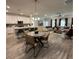 Open-concept living space connecting kitchen, dining, and living areas with lots of seating at 3006 Fairway Dr, Villa Rica, GA 30180