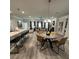 Open-concept living space connecting kitchen, dining, and living areas with lots of seating at 3006 Fairway Dr, Villa Rica, GA 30180