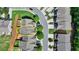 Overhead view of a townhome with a fenced yard, adjacent to green space, offering privacy and outdoor enjoyment at 3123 Cross Creek Dr, Cumming, GA 30040