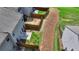 A fenced backyard offers privacy and outdoor space to the townhome, with a small patio area at 3123 Cross Creek Dr, Cumming, GA 30040