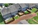 A row of fenced townhome backyards features a small patio and potential for outdoor activities with privacy at 3123 Cross Creek Dr, Cumming, GA 30040