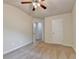 Comfortable bedroom with carpet, ceiling fan and an open doorway to the rest of the house at 3123 Cross Creek Dr, Cumming, GA 30040
