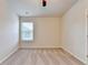 An inviting carpeted bedroom with a ceiling fan and a window at 3123 Cross Creek Dr, Cumming, GA 30040
