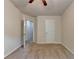 Bedroom with neutral carpet, open door to the side, and ceiling fan overhead at 3123 Cross Creek Dr, Cumming, GA 30040