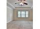 Spacious bedroom featuring a trey ceiling, fan and large windows, providing an airy and bright atmosphere at 3123 Cross Creek Dr, Cumming, GA 30040