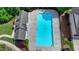 A pristine rectangular swimming pool surrounded by a concrete deck with an adjacent community building at 3123 Cross Creek Dr, Cumming, GA 30040