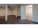 Finished basement with neutral paint, open floor plan, and walk-in closet at 152 Stoneforest Dr, Woodstock, GA 30189