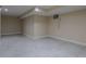 Finished basement has tile flooring and a neutral paint at 152 Stoneforest Dr, Woodstock, GA 30189