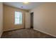 Cozy bedroom with neutral carpet, a window for natural light, and a closet at 152 Stoneforest Dr, Woodstock, GA 30189