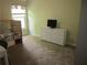 Functional bedroom with natural light and practical furniture at 1527 Princeton Ave, College Park, GA 30337