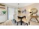 Bright dining room with modern lighting, and sliding glass doors at 256 Grist Mill Ln, Lawrenceville, GA 30046
