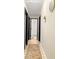 Hallway with hardwood floors, and bathroom entrance at 256 Grist Mill Ln, Lawrenceville, GA 30046