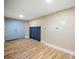 This laundry room has laminate floors, cabinets, and access to a door at 256 Grist Mill Ln, Lawrenceville, GA 30046