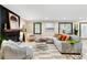 Spacious living room with fireplace, hardwood floors and plenty of natural light at 256 Grist Mill Ln, Lawrenceville, GA 30046
