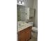 Clean and efficient bathroom featuring a sink, toilet, shower, and storage cabinet at 2825 Northeast Ne Expy # F3, Atlanta, GA 30345