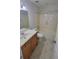 A bathroom featuring a vanity with sink, a toilet, and a bathtub with shower head at 2825 Northeast Ne Expy # F3, Atlanta, GA 30345