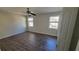 Serene bedroom with wood-look floors, neutral walls, and ample natural light, perfect for relaxation at 2825 Northeast Ne Expy # F3, Atlanta, GA 30345