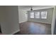 Bright living room featuring wood-look floors, lots of natural light, and a welcoming entrance at 2825 Northeast Ne Expy # F3, Atlanta, GA 30345