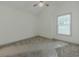 Cozy bedroom features large window and ceiling fan at 1265 Watercrest Cir, Lawrenceville, GA 30043