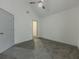The carpeted bedroom has a ceiling fan and access to the closet at 1265 Watercrest Cir, Lawrenceville, GA 30043