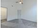 This bright bedroom features a ceiling fan and access to the walk in closet at 1265 Watercrest Cir, Lawrenceville, GA 30043
