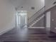 Inviting living room featuring gray flooring, a staircase and natural light at 1265 Watercrest Cir, Lawrenceville, GA 30043