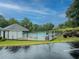 Community pool with fenced area, picnic tables, and a bath house, perfect for relaxation and summer fun at 1265 Watercrest Cir, Lawrenceville, GA 30043
