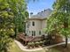 Picture of a house's deck and backyard with trees in the background at 330 Broad Leaf Ct, Johns Creek, GA 30022