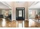 Bright entryway featuring hardwood floors with sidelight windows and transom at 330 Broad Leaf Ct, Johns Creek, GA 30022