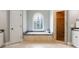 Bathroom features a soaking tub beneath a leaded glass window and a glass enclosed walk-in shower at 330 Broad Leaf Ct, Johns Creek, GA 30022