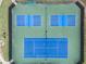Overhead view of blue pickleball courts with green surrounding, ideal for sports enthusiasts at 330 Broad Leaf Ct, Johns Creek, GA 30022