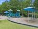 Vibrant community playground with slides and swings, providing a fun and safe recreational area for  at 330 Broad Leaf Ct, Johns Creek, GA 30022