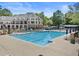 Resort-style swimming pool with lap lanes and lounge area, ideal for relaxation and recreation at 330 Broad Leaf Ct, Johns Creek, GA 30022