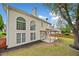 Beautiful backyard featuring a covered patio perfect for entertaining, along with lush landscaping and mature trees at 604 Bassett Se Ct, Smyrna, GA 30080