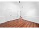Spacious bedroom with vaulted ceiling, hardwood flooring, and neutral paint at 604 Bassett Se Ct, Smyrna, GA 30080