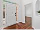 Bright foyer with hardwood floors, leading to other rooms at 604 Bassett Se Ct, Smyrna, GA 30080