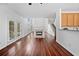 Open floor plan featuring hardwood floors, fireplace, staircase and natural light at 604 Bassett Se Ct, Smyrna, GA 30080