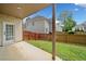 Home featuring a covered patio and fenced backyard, providing privacy and space for relaxation and entertainment at 604 Bassett Se Ct, Smyrna, GA 30080