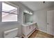 Stylish bathroom features a double vanity, modern fixtures, and great light at 6845 Gledhill Way, Stone Mountain, GA 30087