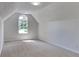 Neutral bedroom with carpet, vaulted ceilings, and natural light at 6845 Gledhill Way, Stone Mountain, GA 30087