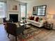 Stylishly decorated living room with cozy fireplace, comfortable seating, and modern decor at 1195 Park Center Cir, Austell, GA 30168
