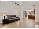 Open-concept living area with hardwood floors flowing into the kitchen, perfect for entertaining and Gathering gatherings at 2821 Amhurst Nw Way, Kennesaw, GA 30144