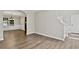 Open living area and stairway featuring hardwood floors at 2821 Amhurst Nw Way, Kennesaw, GA 30144