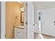 Charming powder room featuring granite countertop and modern fixtures at 2821 Amhurst Nw Way, Kennesaw, GA 30144