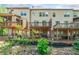 Back view of the home with multiple decks overlooking the backyard at 286 Blue Pointe Ct, Suwanee, GA 30024